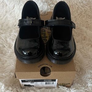 Dr. Martens Kids Glossy Black Mary Janes - Bows Included